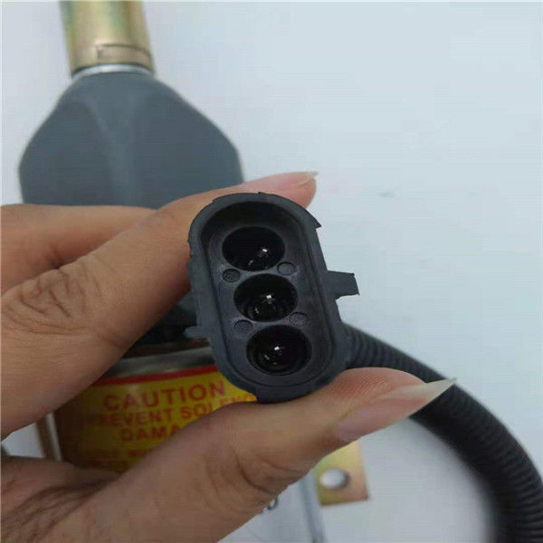 3926411 / SA-4257-12 إيقاف صمام الملف اللولبي مناسب لأجزاء محرك حفارة Cummins 6CT